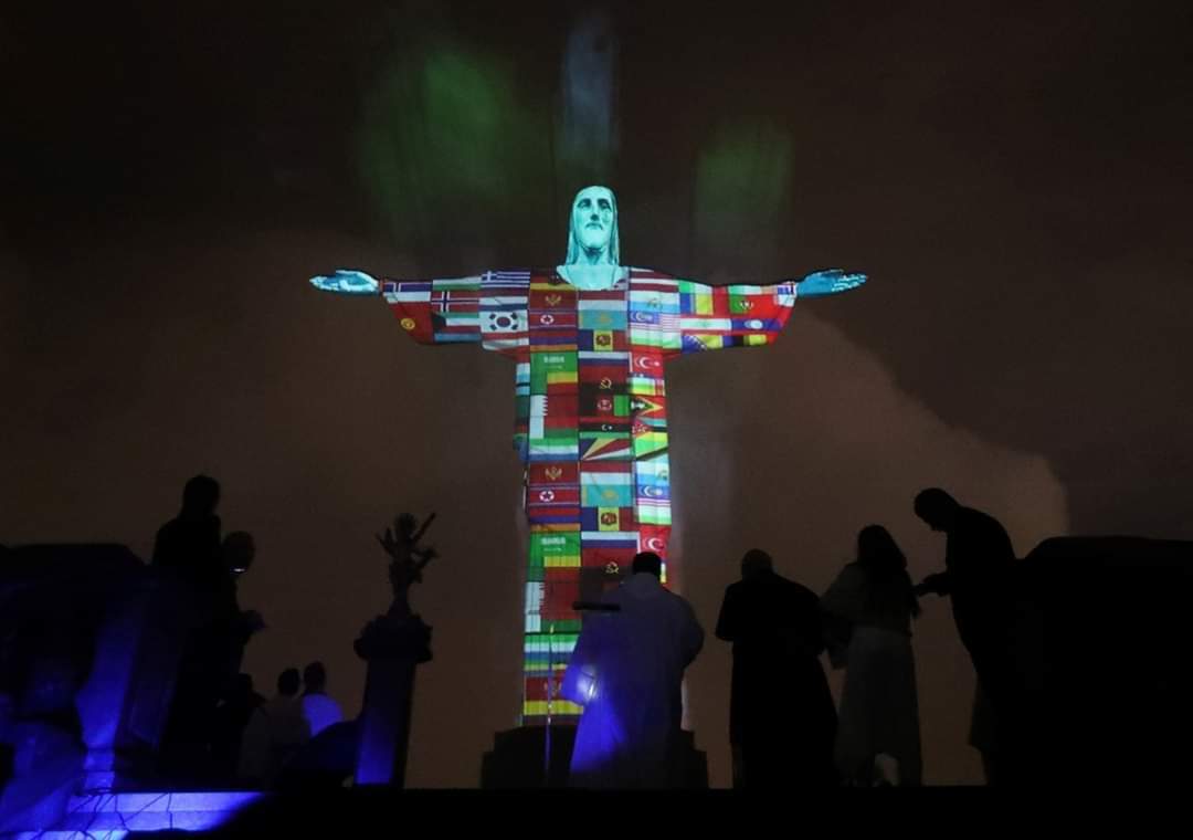 Brazil’s Christ the Redeemer statue lit with flags of countries affected by COVID-19