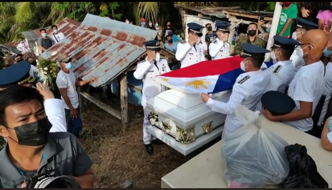 Full funeral honors, 21-gun salute for Captain Olano